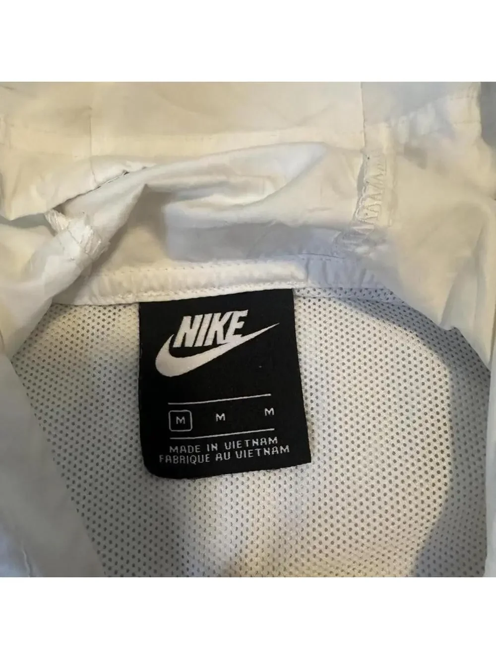 Nike women’s Windbreaker triple white